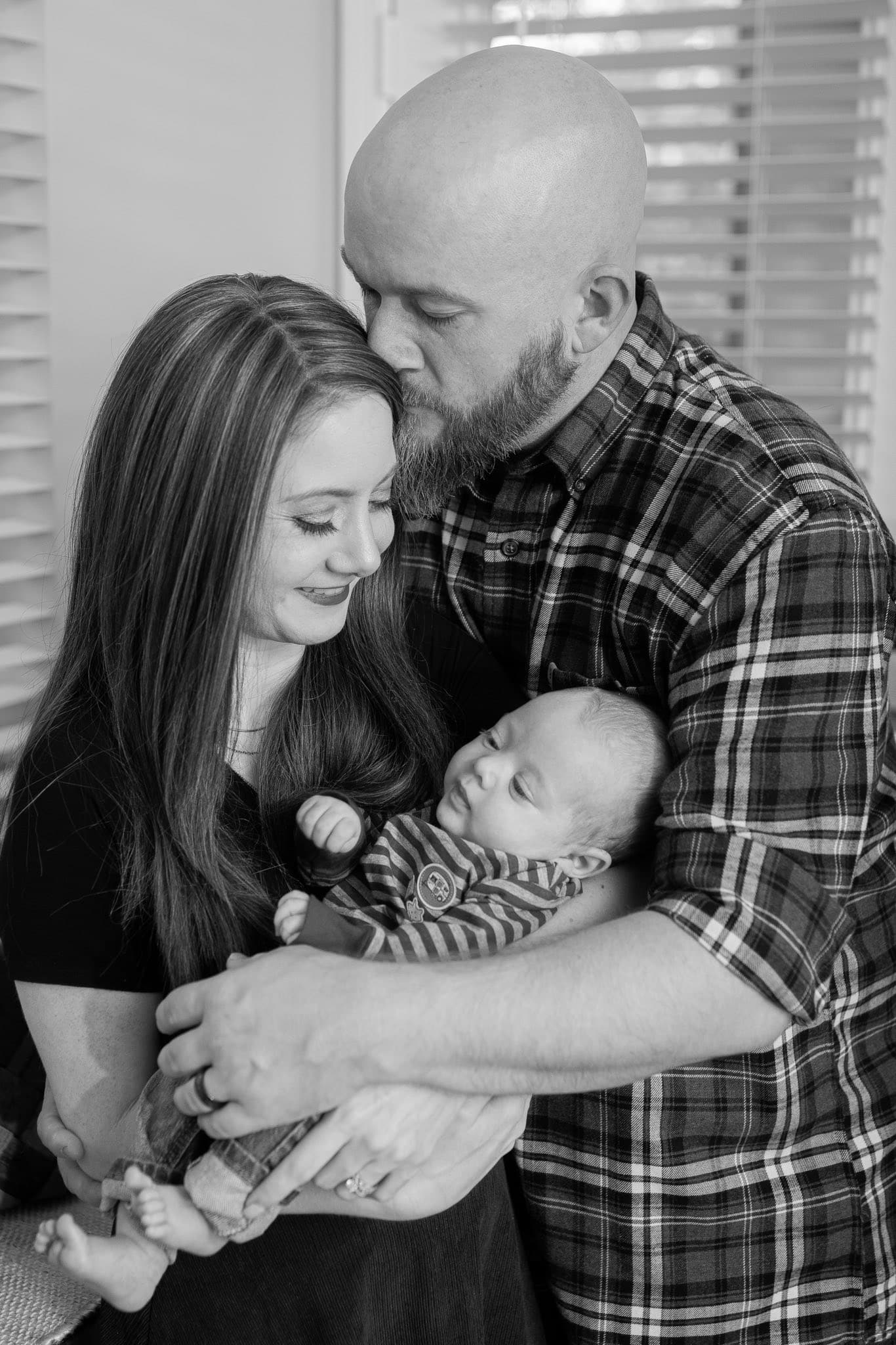 Family with newborn photo in black and white